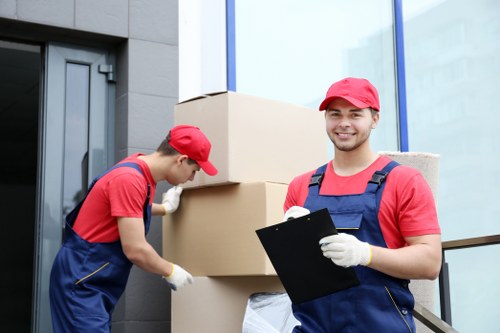 Local moving truck helping with furniture transport in Finchley