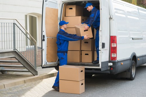 Packed moving boxes and furniture ready for local removals in Finchley