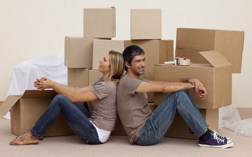 Packed boxes and furniture ready for a Finchley moving van