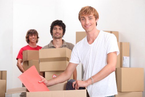 Packing office furniture and equipment for relocation in Finchley